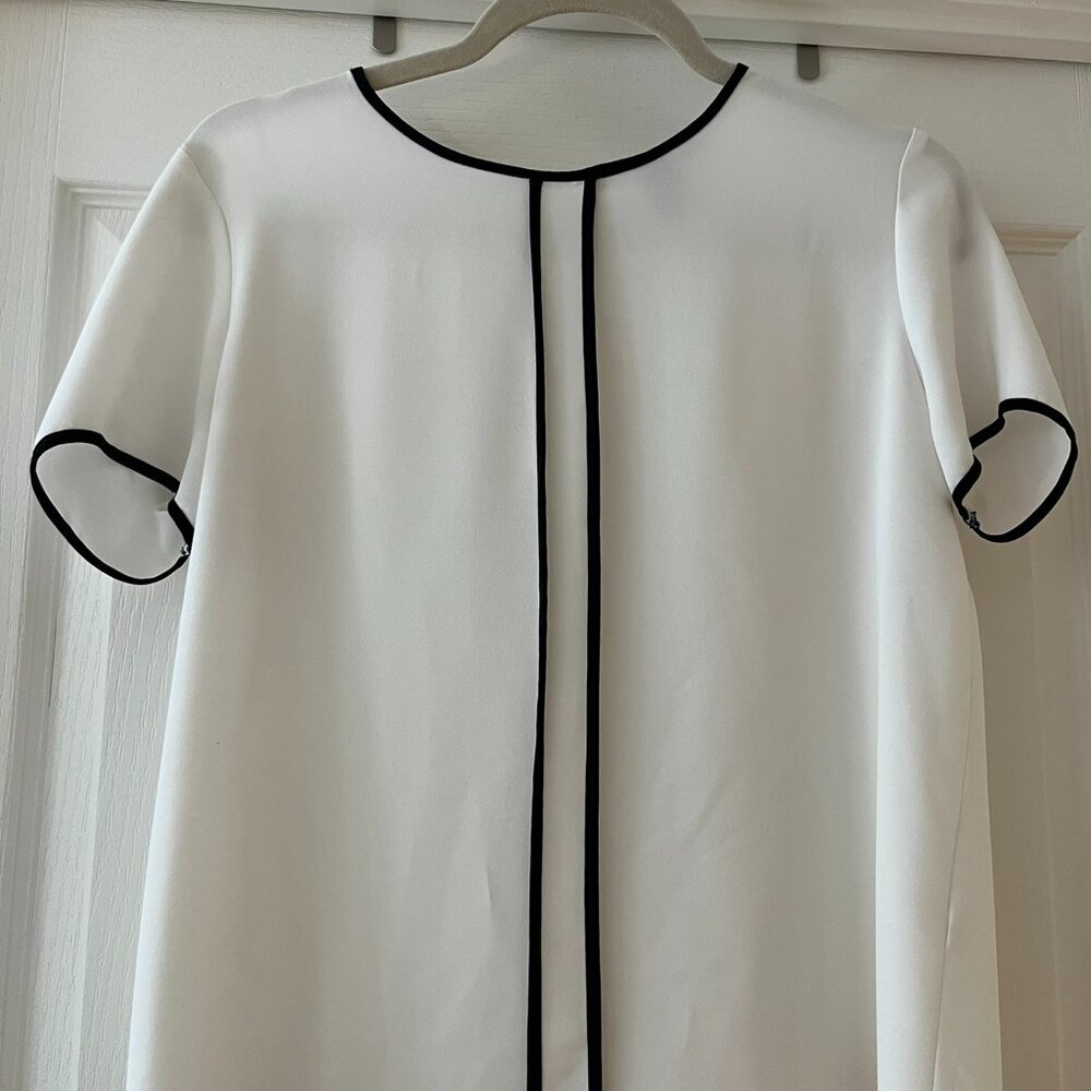 Forever21 White short-sleeve blouse with black piping